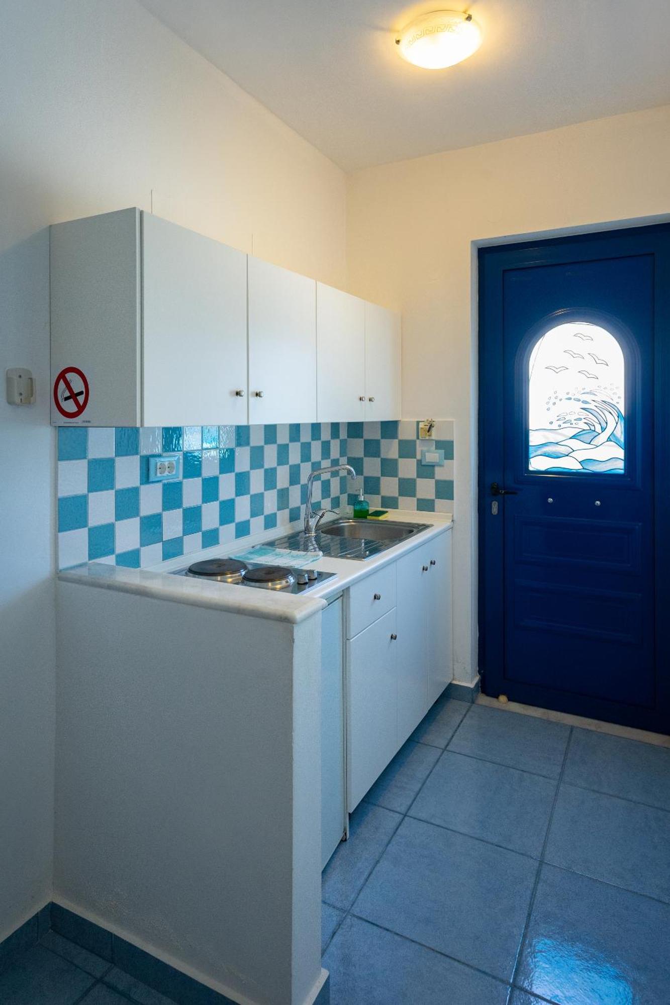 Stegna-Tula Aparthotel Archangelos  Bagian luar foto